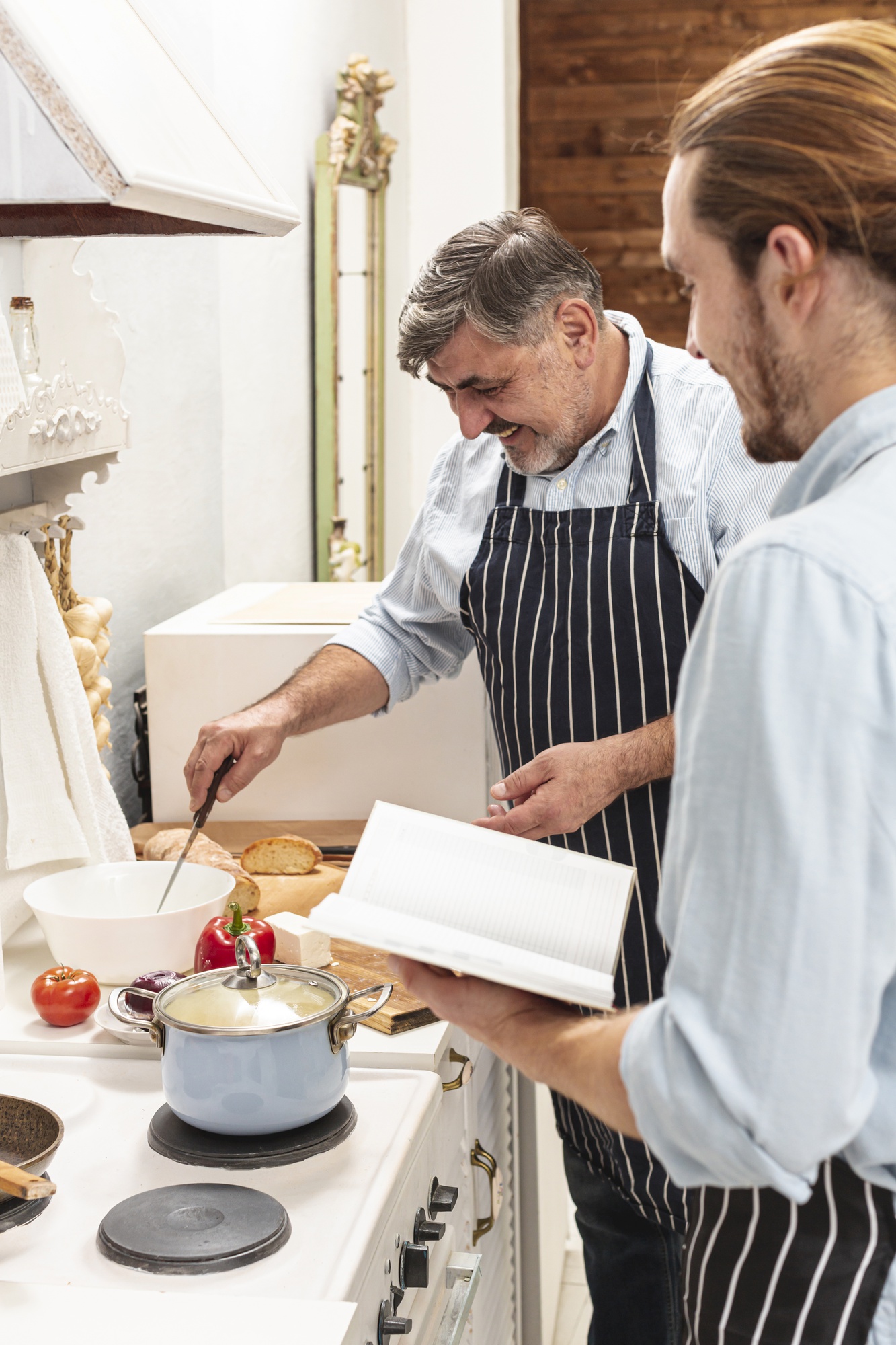Workshop instructor guiding participants in a kitchen